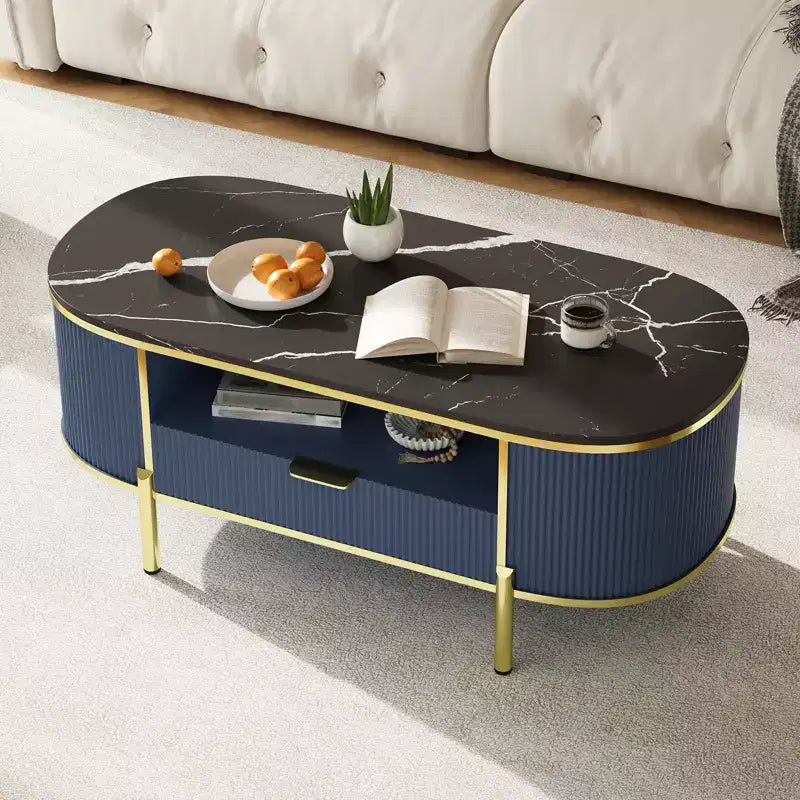 Table basse ovale cannelée bleu / chêne avec plateau effet marbre, cadre doré et tiroir